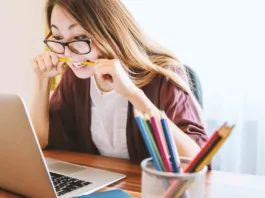 Student Loan Payments - Student Biting Pencil